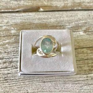 Cut Out Oval Blue Topaz Ring with Swirls